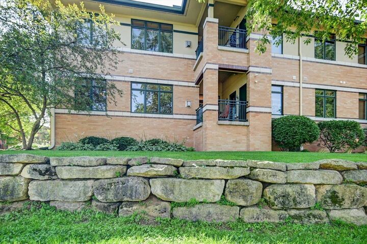 Property Photo: 6767 Frank Lloyd Wright Avenue 103 WI 53562