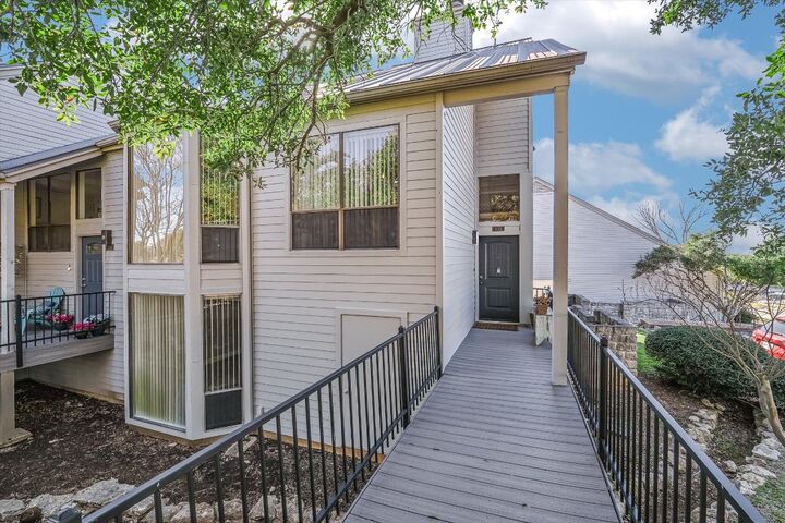 Property Photo:  115 World Of Tennis Square  TX 78738 