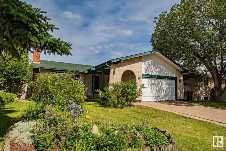 Property Photo: 3225 108 Street NW AB T6J 3C9