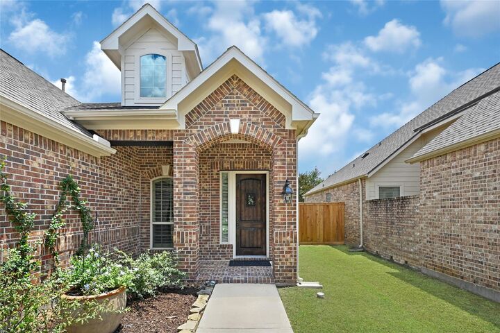 Property Photo: 4943 Caponi Falls Lane TX 77494