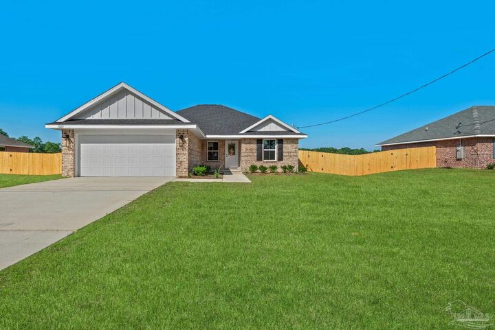 Property Photo: 7929 Twin Lake Dr FL 32583