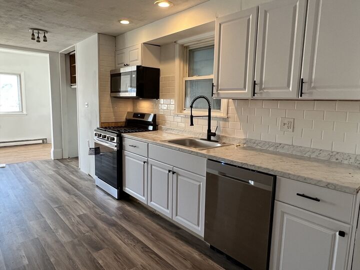 Property Photo:  209 Lexington 1  MA 02128 