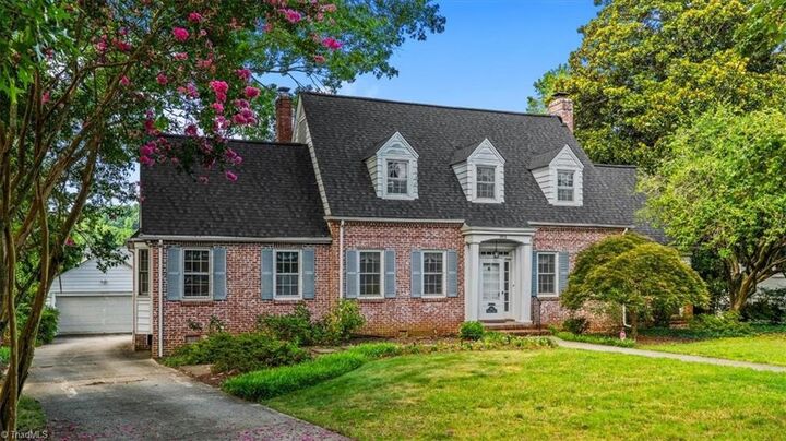 Property Photo:  703 Woodland Drive  NC 27408 