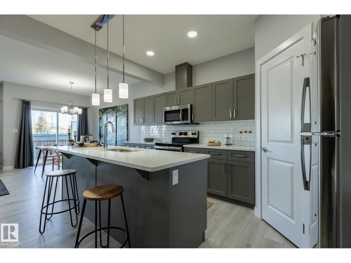 Property Photo:  10714 99 St  AB T8R 2R8 