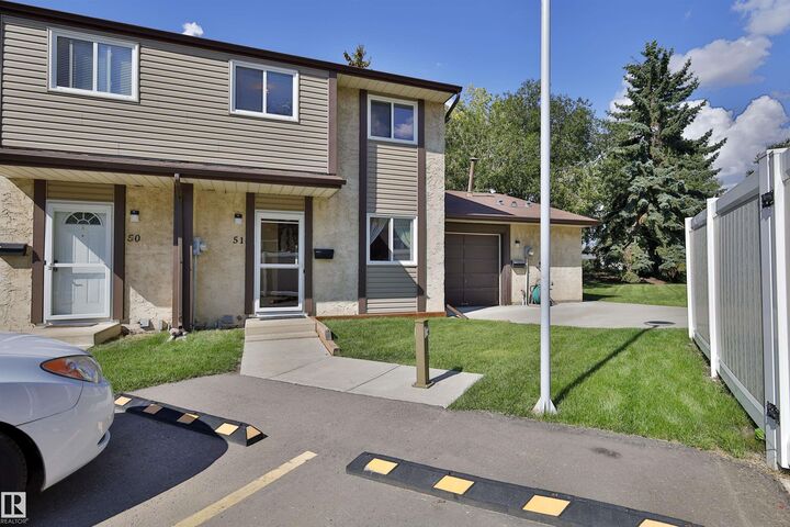 Property Photo: 10453 20 Avenue NW 51 AB T6J 5H1