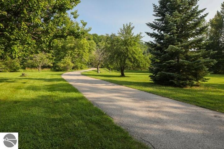 Property Photo:  12142 Peninsula Drive  MI 49686 