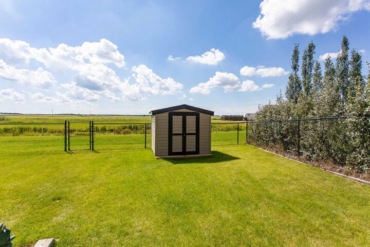 Property Photo: 4546 Iron Wolf Place 22 AB T4L 0G1