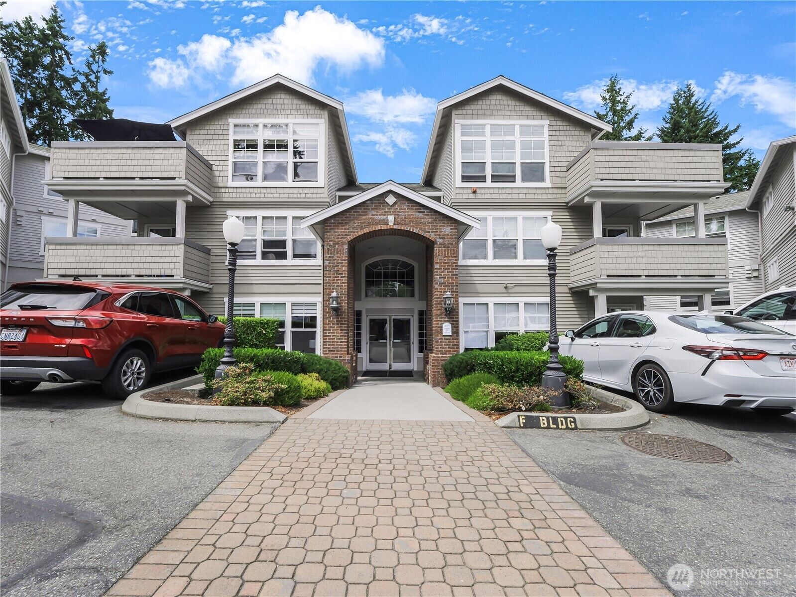 Property Photo:  8500  Main Street F-209  WA 98026 