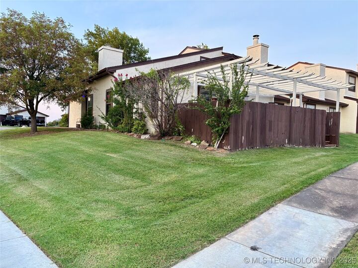 Property Photo: 13512 E 30th Street A OK 74134