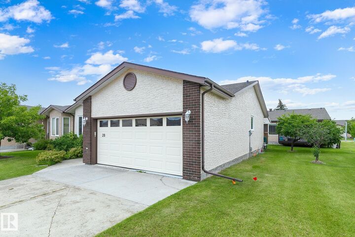 Property Photo: 28 Sunrise Village AB T7Z 1L2