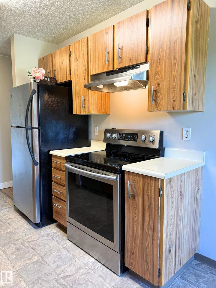 Property Photo:  10842 107 Street NW 303  AB T5H 2Z3 