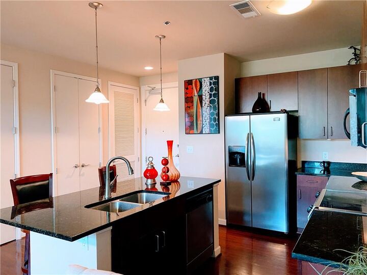Property Photo: 711 Cosmopolitan Drive NE 203 GA 30324