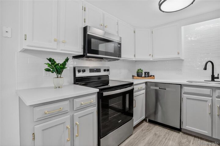 Property Photo: 15350 E Arizona Avenue 106 CO 80017
