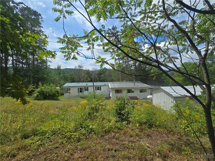 Property Photo:  8988 County Rd 20  NY 14727 