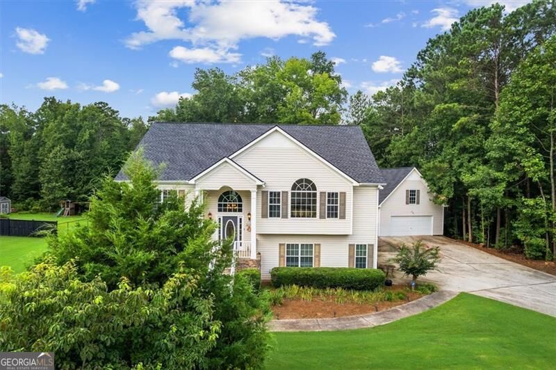 Property Photo:  6915 Fletcher Drive  GA 30187 