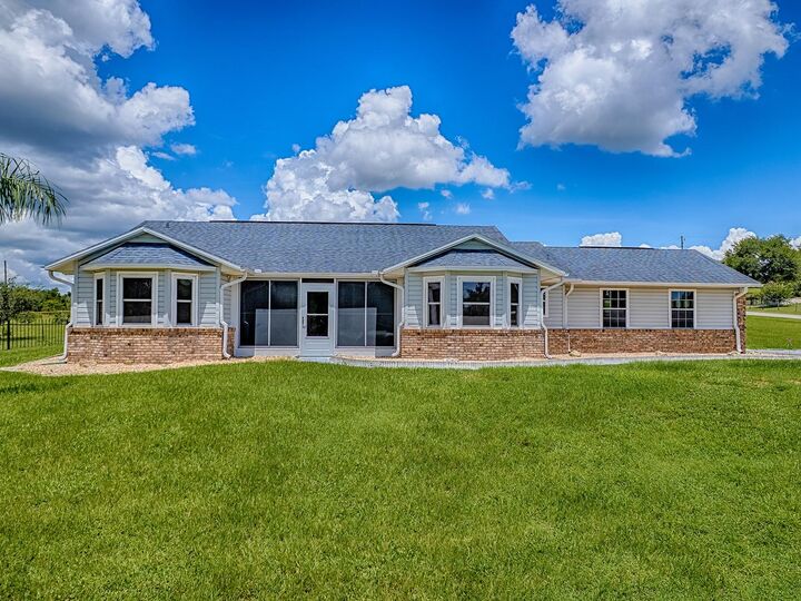 Property Photo:  3711 Gregory Road  FL 32159 