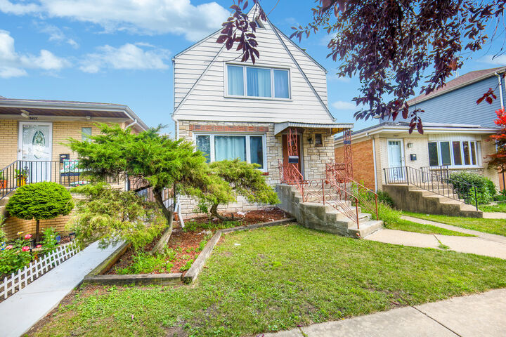 Property Photo:  3409 N Osage Avenue  IL 60634 