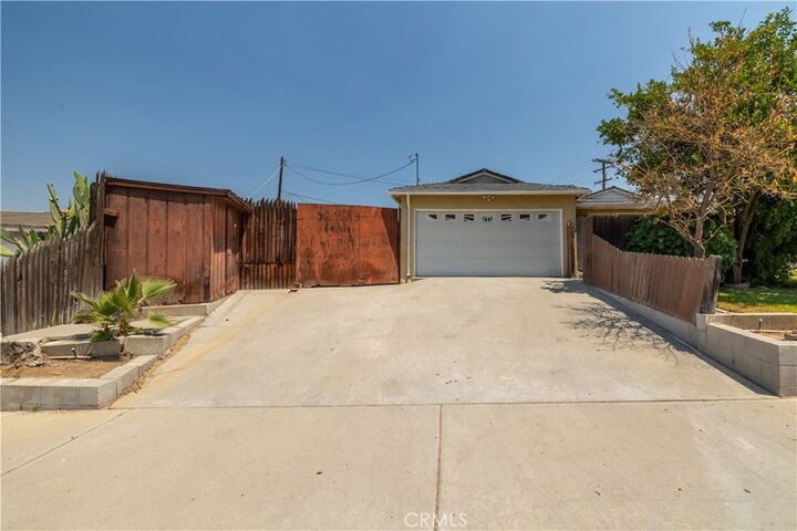 Property Photo:  8817 Wells Avenue  CA 92503 
