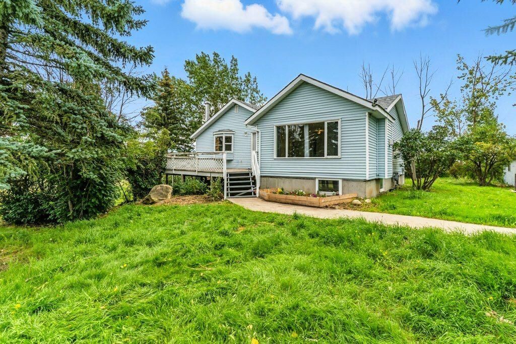 Property Photo: 290003 96 Street E AB T1S 3Y9