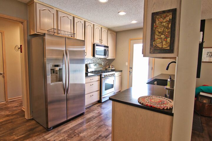 Property Photo: 7700 E 13th St N KS 67206