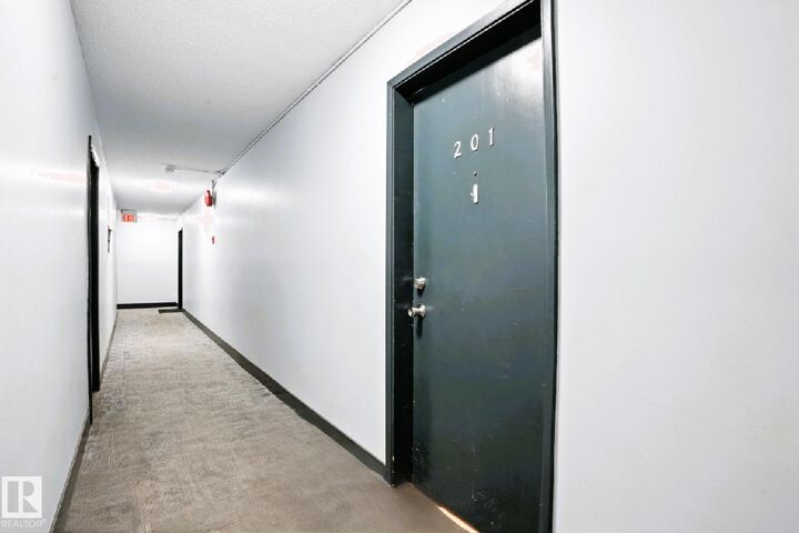 Property Photo: 10720 127 Street NW 201 AB T5M 0S3