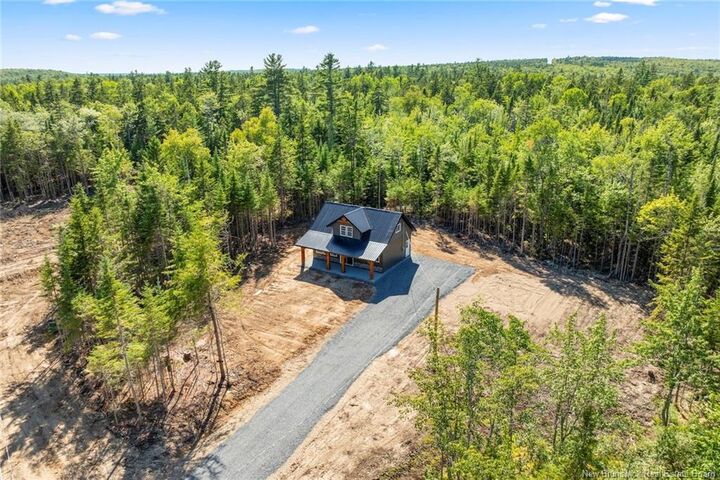 Property Photo:  114 John Chessie Drive  NB E6K 2Z6 