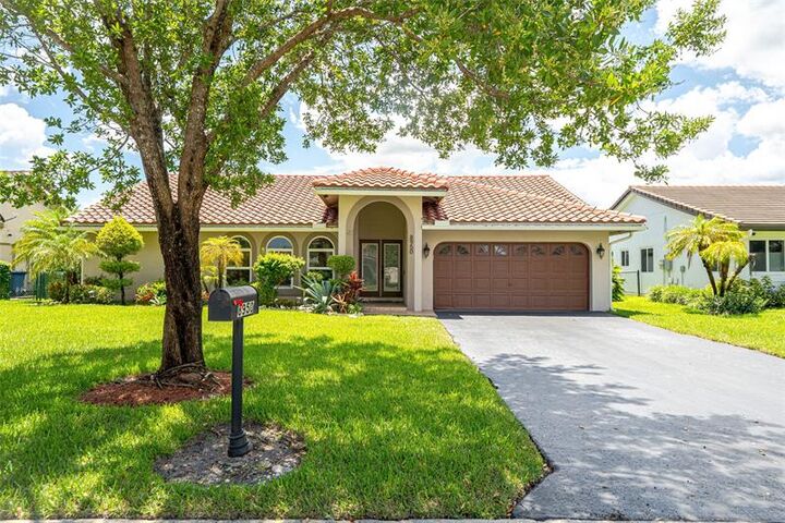 Property Photo:  8950 NW 45th Ct  FL 33065 