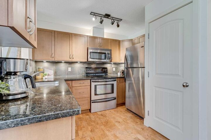 Photo de la propriété:  203 Village Terrace SW 10  AB T3H 2L2 