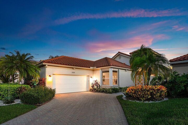 Property Photo:  6210 Evian Place  FL 33437 