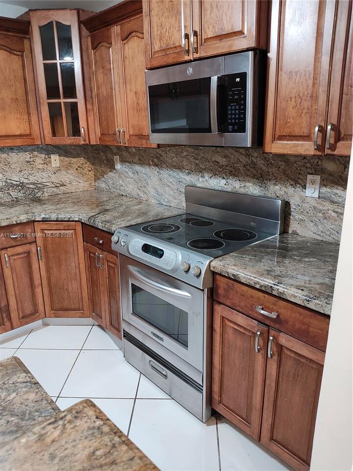 Property Photo: 9735 NW 52nd St 411 FL 33178