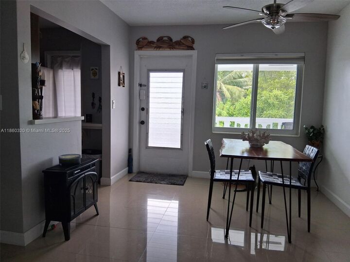 Property Photo:  6560 Winfield Blvd 204  FL 33063 
