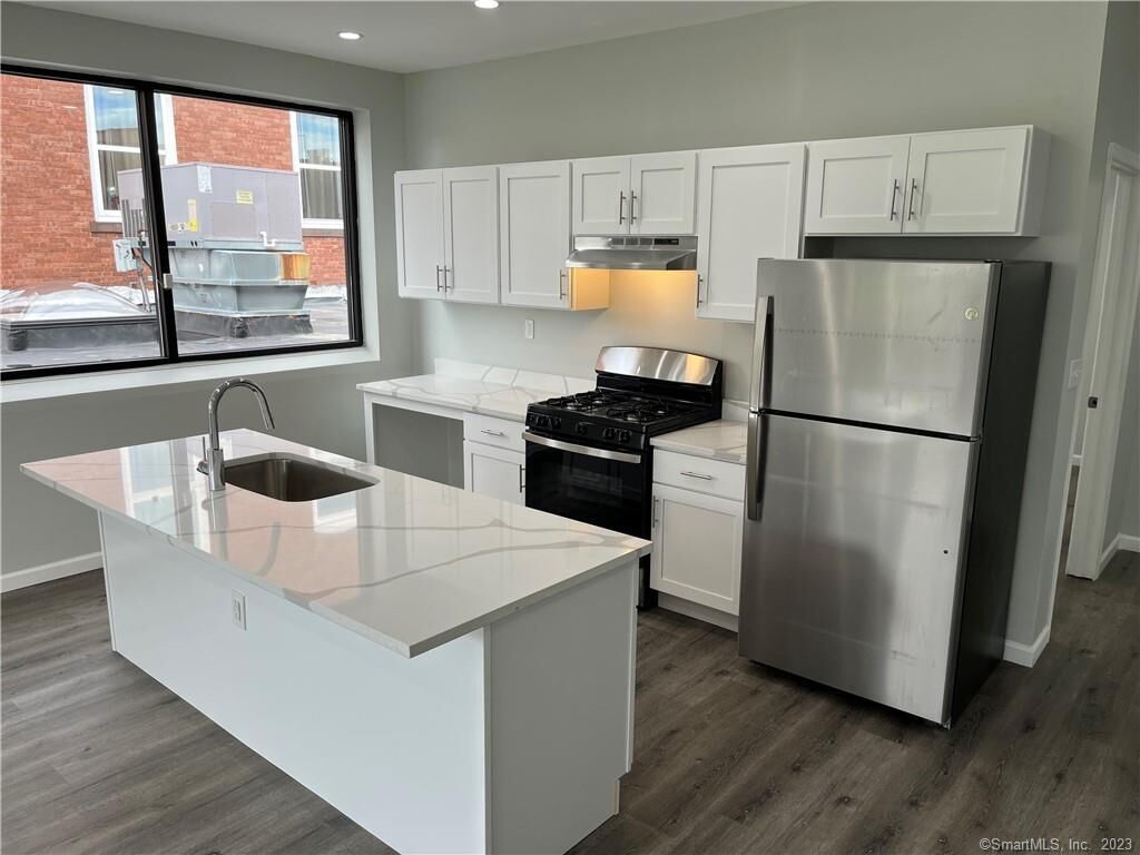 Property Photo: 893 Main Street 202 CT 06040