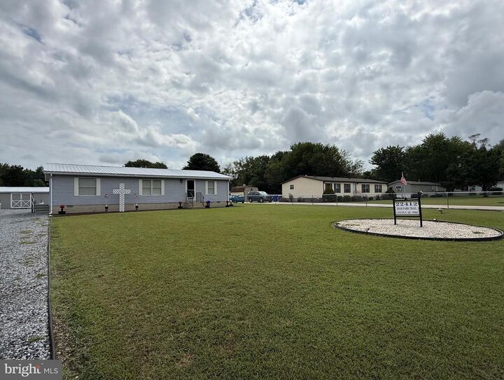 Property Photo:  22412 Deer Park Trail  DE 19960 
