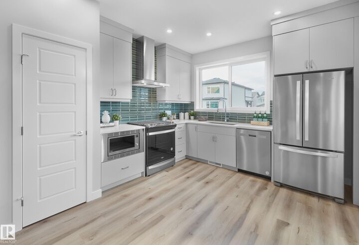 Property Photo:  1218 Cristall Way SW  AB T6W 5S5 