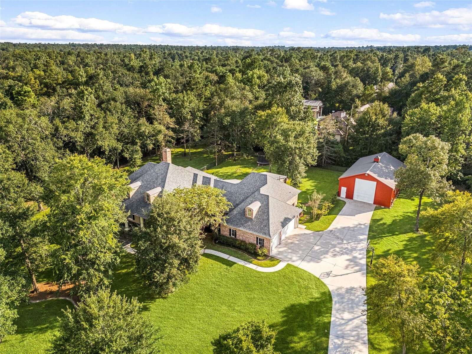 Property Photo: 6902 Texas Trace TX 77316