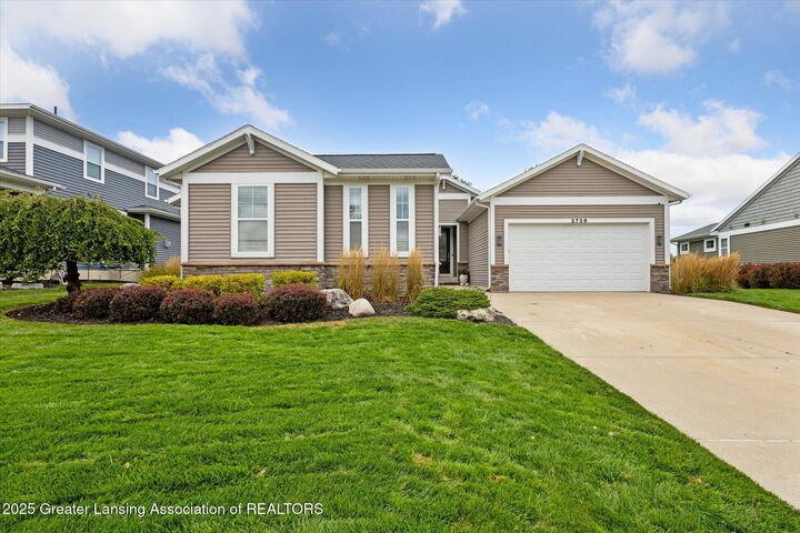 Property Photo:  2726 Kittansett Drive  MI 48864 