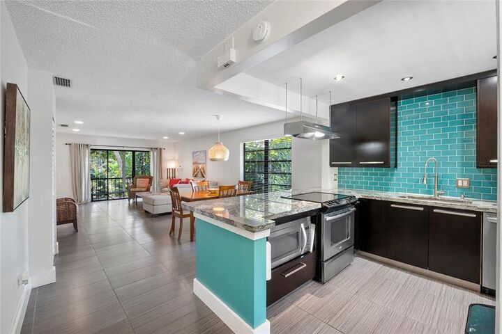 Property Photo: 21648 Cypress Rd 13-G FL 33433
