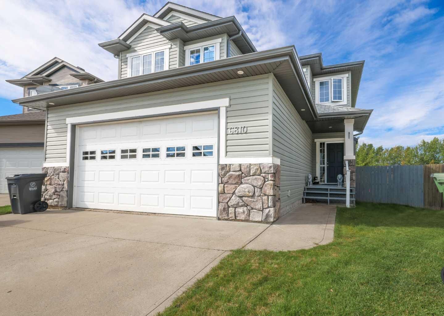 Property Photo:  6810 59 Street Close  AB T4T 1V9 