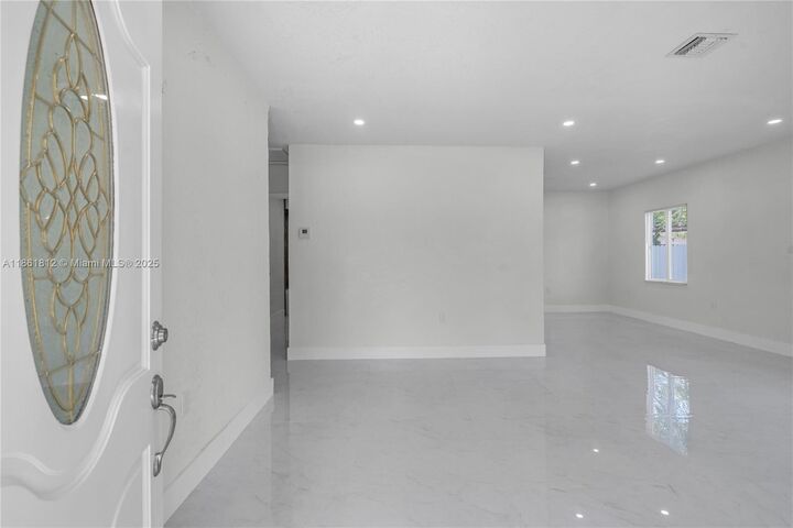 Property Photo: 910 NW 123rd St FL 33168