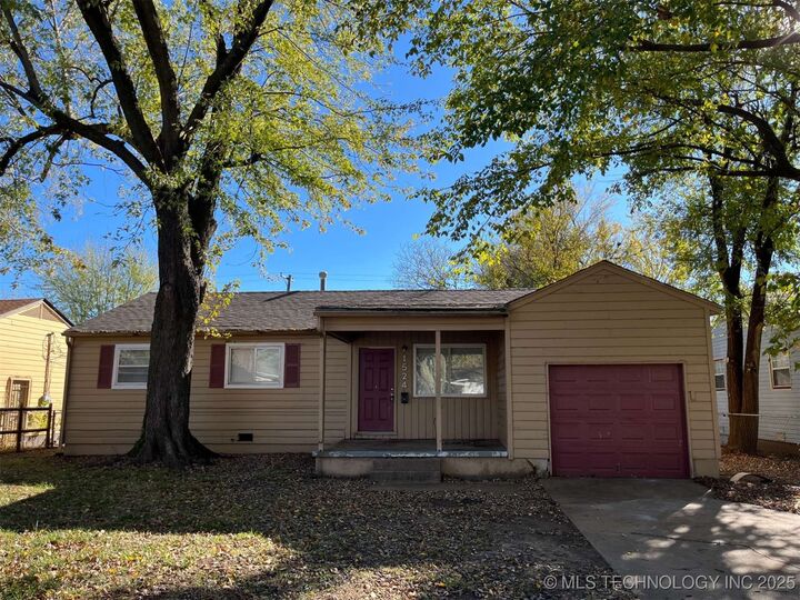 Property Photo: 1524 E 53rd Street N OK 74126