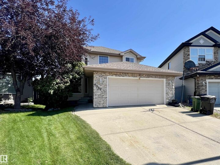 Property Photo: 6957 Strom Lane NW AB T6R 0J9