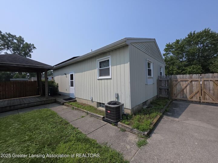 Property Photo: 5731 Pheasant Avenue MI 48911
