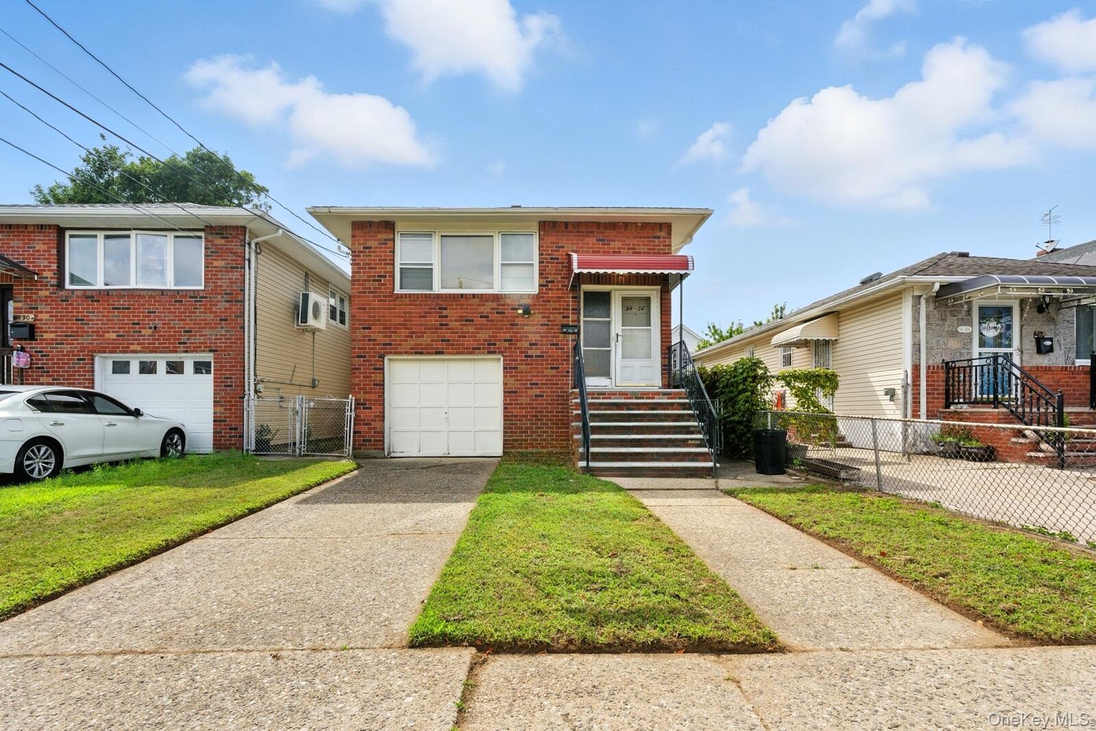 Property Photo:  94-34 238th Street  NY 11001 