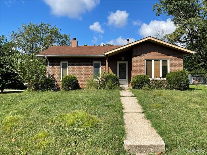 Property Photo: 9803 Balboa Drive MO 63136