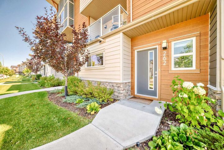 Property Photo: 262 Harvest Hills Way NE AB T3K 2P3