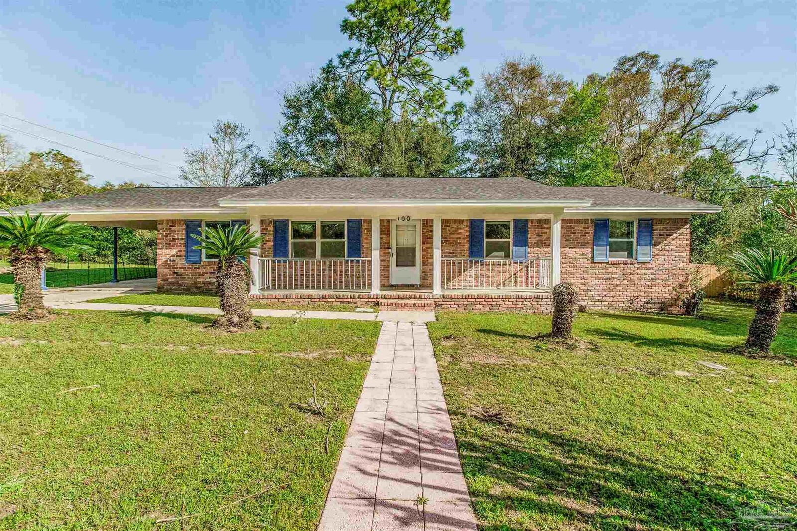 Property Photo:  100 Mango St  FL 32503 