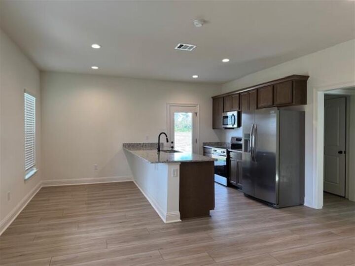 Property Photo: 3143 E Blue Heron Drive E LA 70615