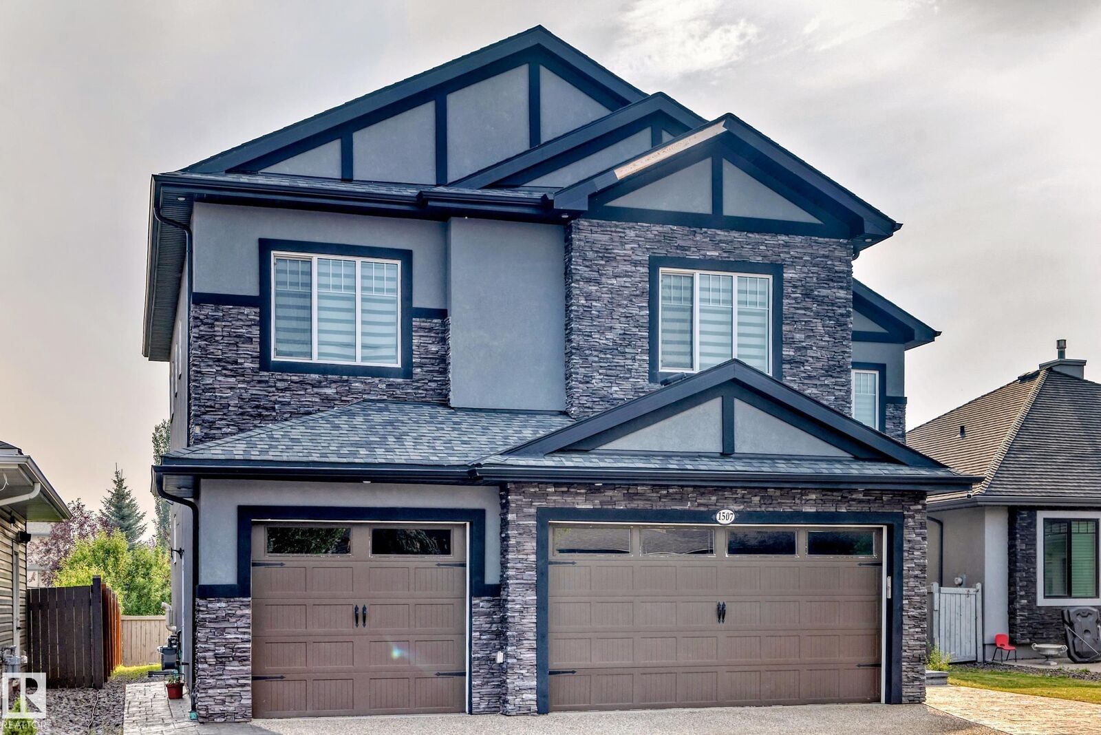 Property Photo: 1507 Adamson View SW AB T6W 0V4