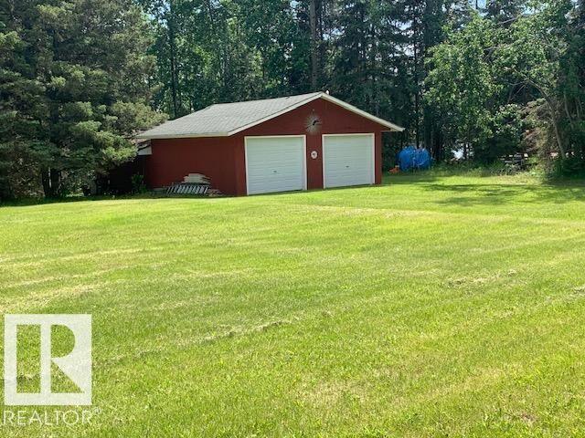 Property Photo: 1121 Baptiste Drive AB T9S 1R8