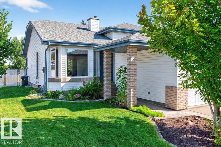 Property Photo: 94 La Costa Fairway Close AB T7Z 2A5
